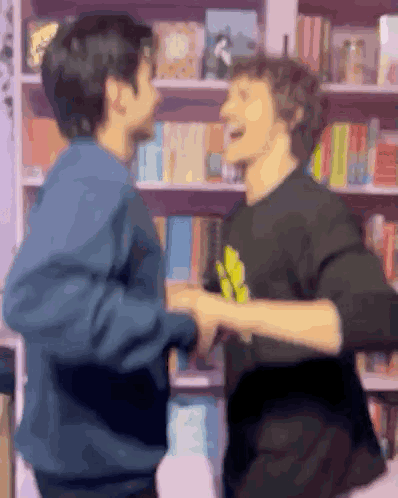 Two Men Shaking Hands GIF