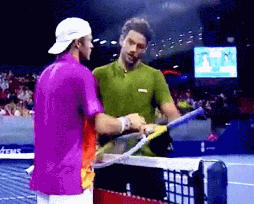 Two Men Shaking Hands Purple Shirt