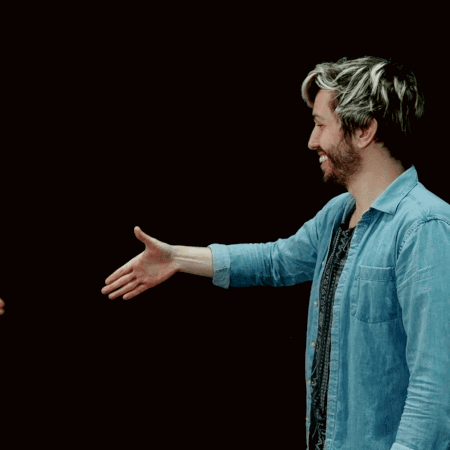 Two Men Shaking Hands With One Wearing A Shirt That Says Aeropostale GIF