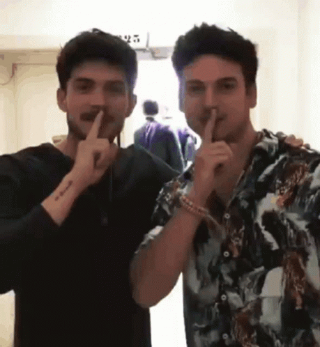 Two Men Shushing GIF