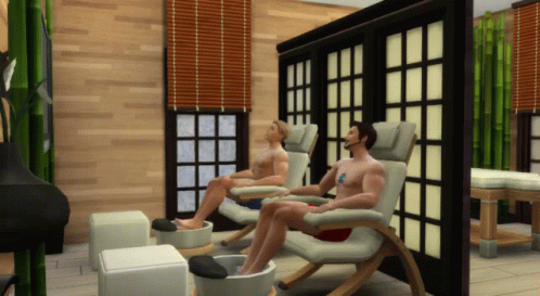 Two Men Sit In Chairs With Their Feet In A Tub GIF
