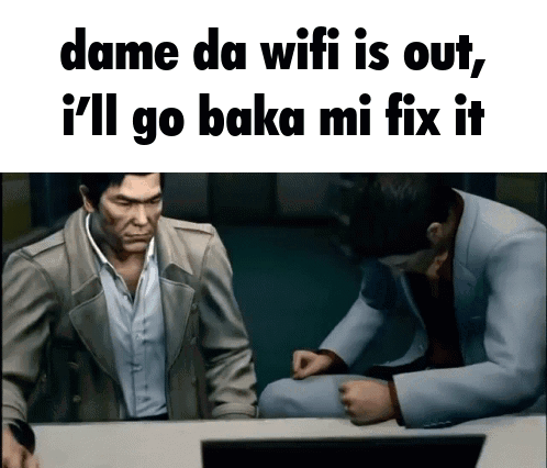 Two Men Sitting At A Table With The Words Dame Da Wifi Is Out And I 'Ll Go Baka Mi Fix It GIF