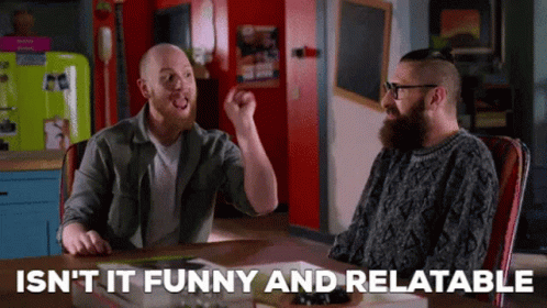 Two Men Sitting At Table With Isn't It Funny And Relatable GIF