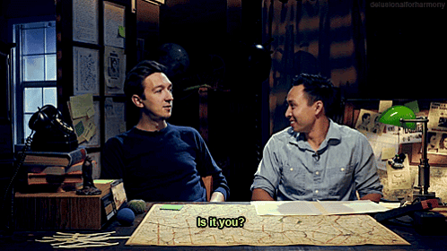 Two Men Sitting At Desk One Says Is It You GIF