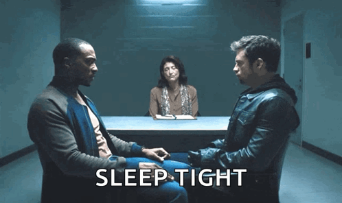 Two Men Sitting at Table Saying Sleep Tight