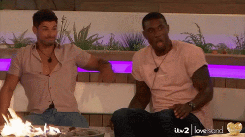Two Men Sitting By ITV2 Love Island Fire Pit GIF