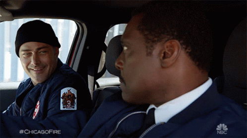 Two Men Sitting in Car Hashtag Chicagofire