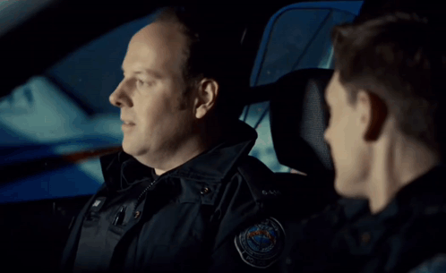 Two Men Sitting in Car With Gonna Find Another Friend