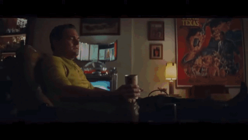 Two Men Sitting in Living Room Saying Buffer That