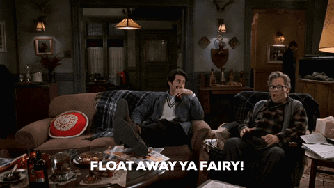 Two Men Sitting On A Couch With The Words " Float Away Ya Fairy " GIF