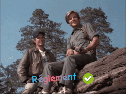 Two Men Sitting On A Rock With The Word Reglement On The Bottom Left GIF
