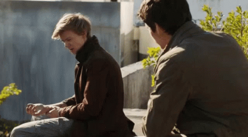 Two Men Sitting On Bench Talking GIF