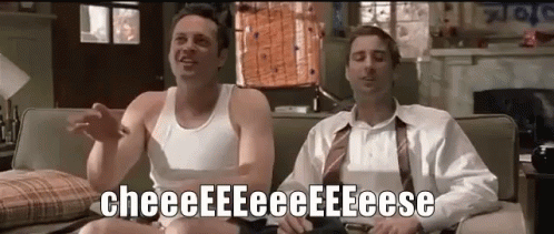 Two Men Sitting on Couch in Underwear