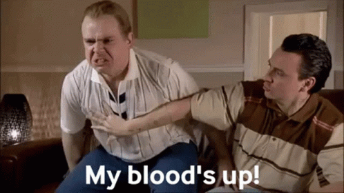 Two Men Sitting on Couch Saying My Blood's Up