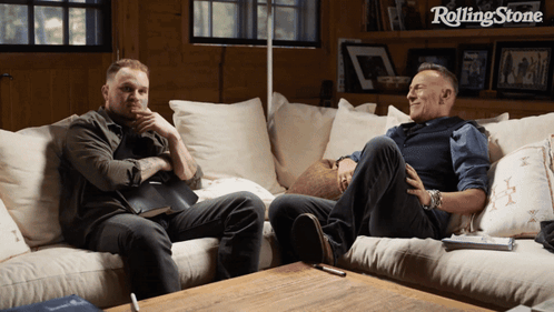 Two Men Sitting on Couch