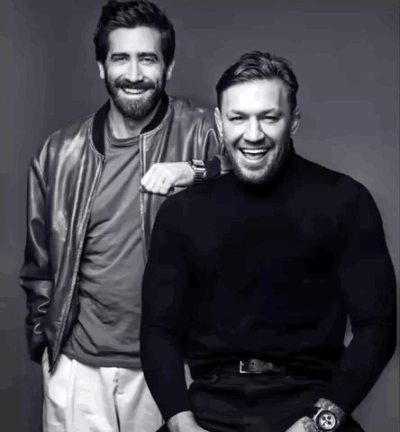 Two Men Smiling Side by Side