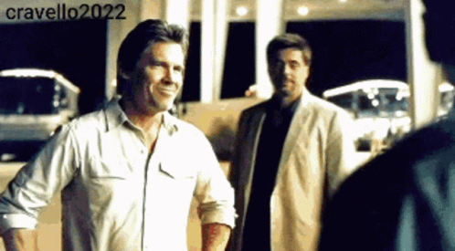 Two Men Standing in Front of Building Cravello2022