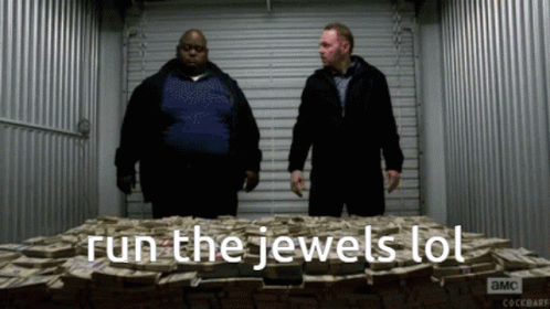 Two Men Standing in Front of Money Pile Run the Jewels LOL