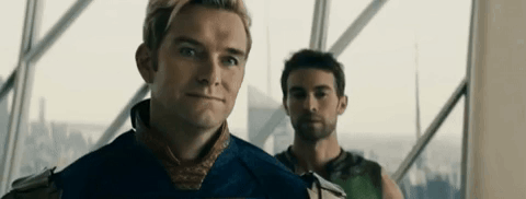 Two Men Standing In Front Of Window GIF