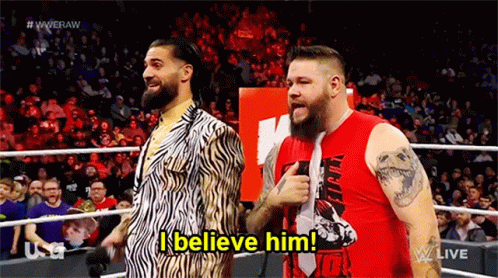 Two Men Standing in Wrestling Ring