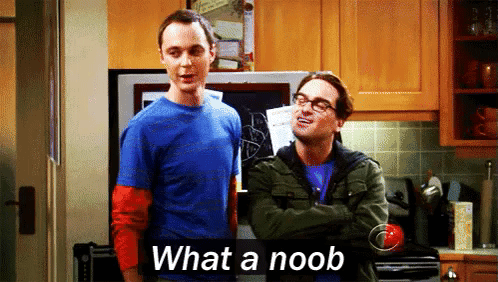 Two Men Standing Next To Each Other In A Kitchen With The Words What A Noob On The Bottom GIF