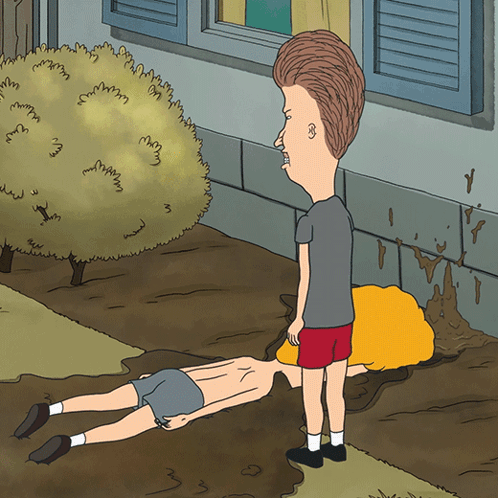 Two Men Standing Next to Each Other