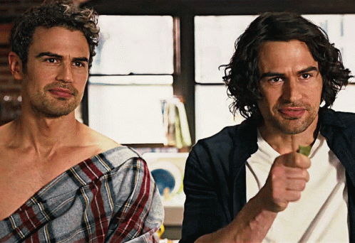 Two Men Standing Next To Each Other GIF
