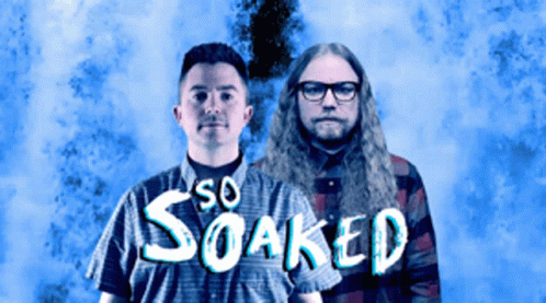Two Men Standing Next To Each Other With The Words So Soaked Written In White Letters GIF