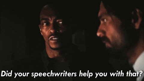 Two Men Standing Next To Each Other With Ending Text GIF