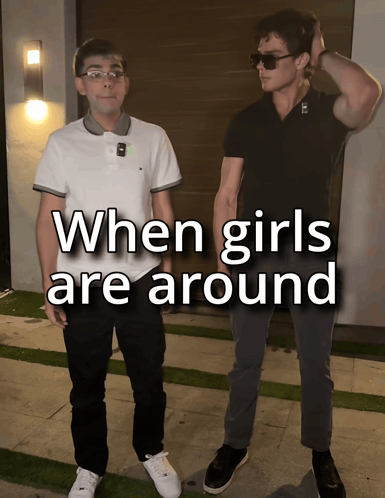 two men standing next to each other with the words when girls are around on the bottom
