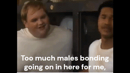 Two Men Standing Next to Each Other With Too Much Males Bonding Going On in Here for Me