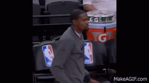 Two Men Standing Next To Gatorade GIF