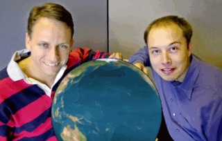Two Men Standing Next To Globe GIF
