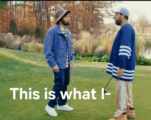 Two Men Standing On A Grassy Field With The Words This Is What I- GIF