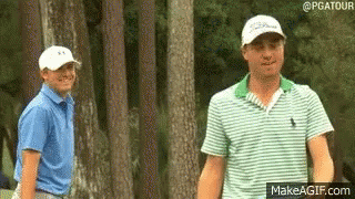 Two Men Standing on Golf Course