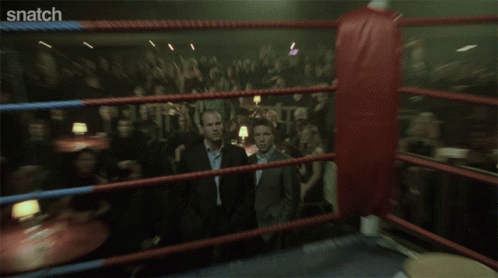 Two Men Standing Saying Snatch