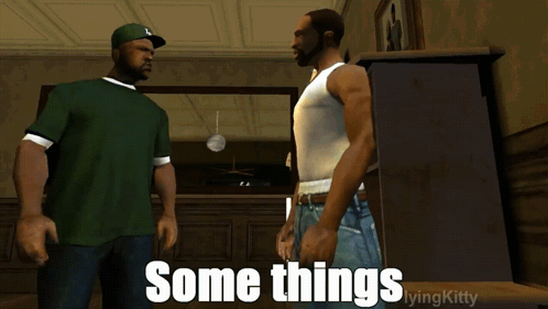 Two Men Standing Together Saying Some Things GIF