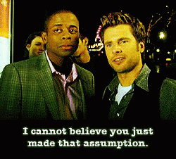 Two Men Standing With Caption I Cannot Believe You Just Made That Assumption GIF