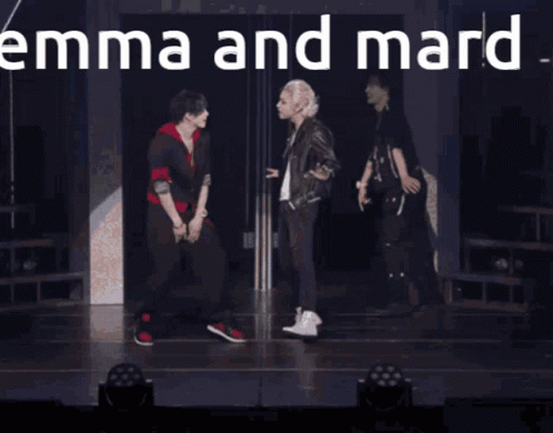 Two Men Standing with Emma and Mard