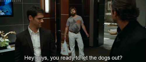 Two Men Talking In Hallway GIF