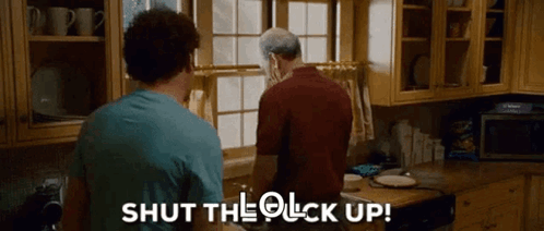 Two Men Talking In Kitchen GIF