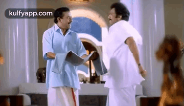 Two Men Talking In Living Room GIF