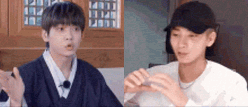 Two Men Talking In Room GIF