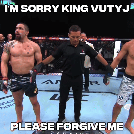 Two Men Talking Next To Fight Week Sign GIF