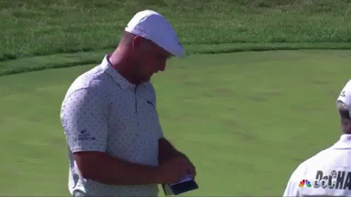 Two Men Talking on Golf Course