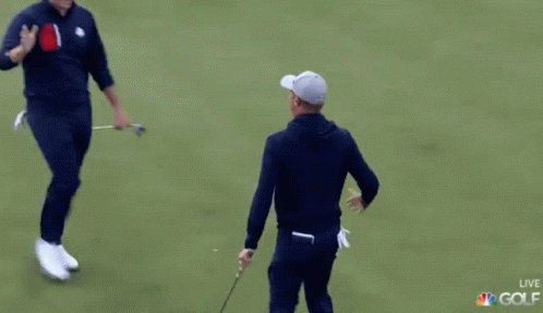 Two Men Talking on Golf Course