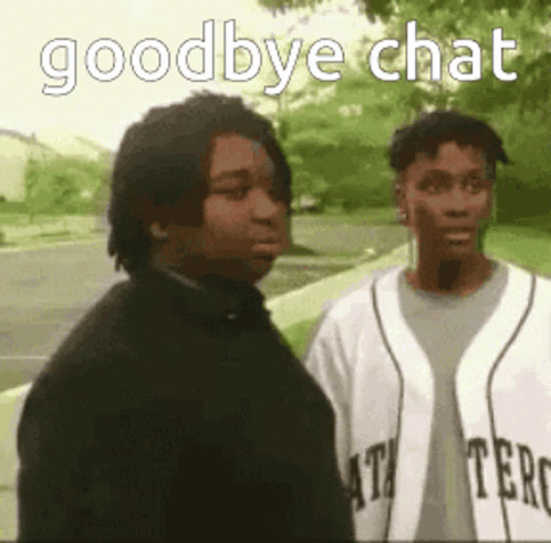 Two Men Talking On Sidewalk GIF