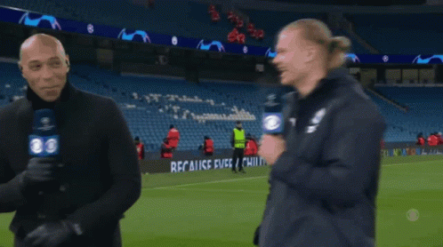 Two Men Talking on Soccer Field Saying Recalice Fuse
