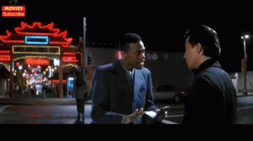 Two Men Talking On Street Movies Subscribe Sign GIF
