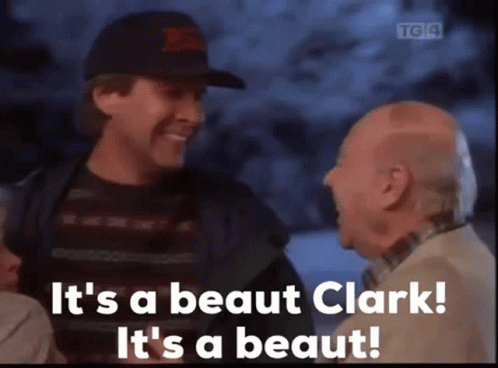 Two Men Talking One Wearing Hat GIF